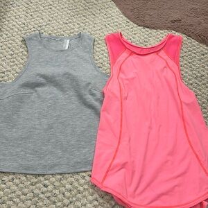 Two Lululemon muscle tanks